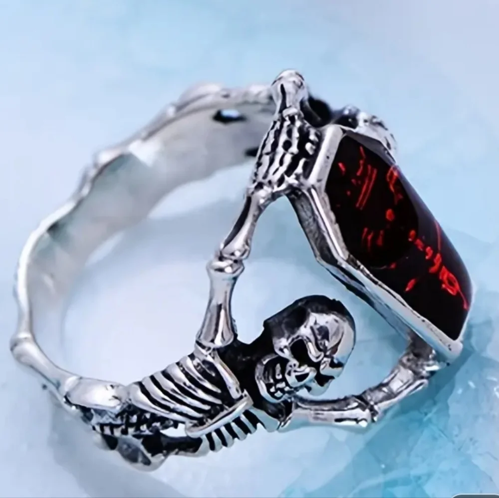 Skeleton Ring with Synthetic Red Zirconia and Alloy Band.